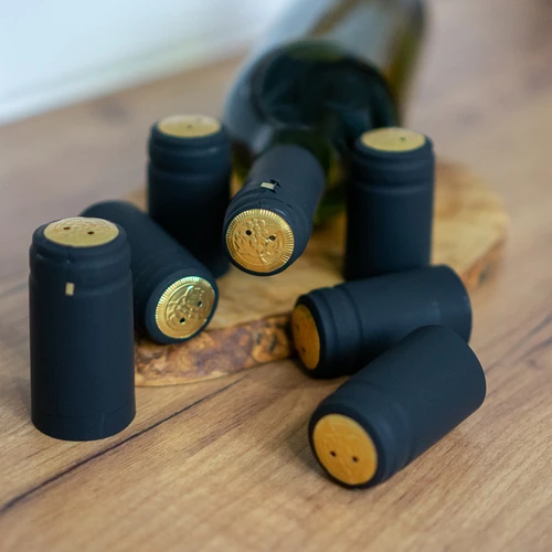 Perforoituja mustia korkkeja fi31mm 100kpl. - 2